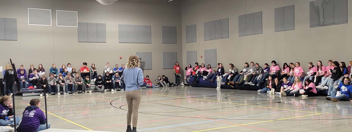 The Bank of Tioga employee speaks to students