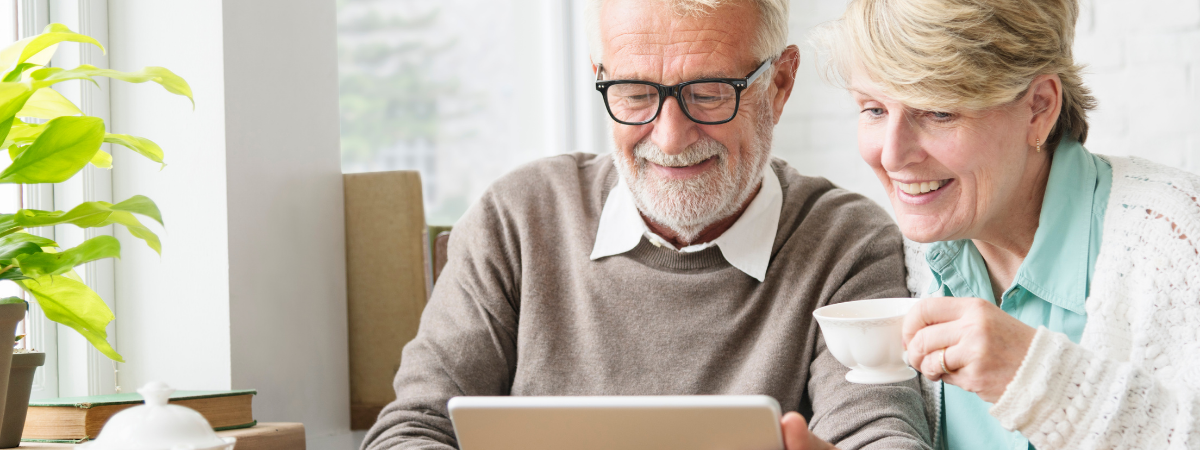 Older couple looking at computer