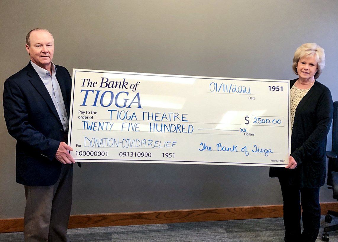 Tioga Theater receiving a check from The Bank of Tioga