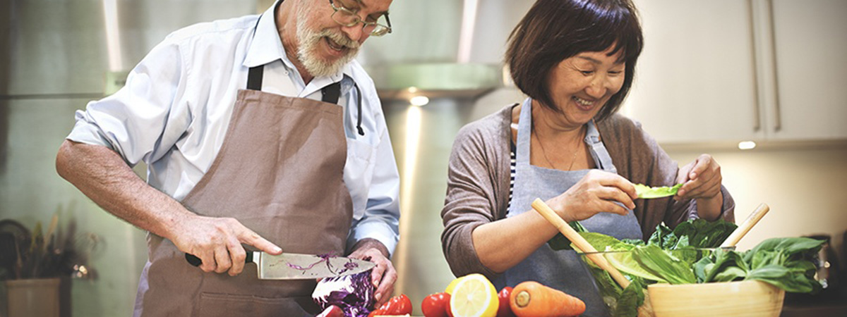 a man and woman cooking together