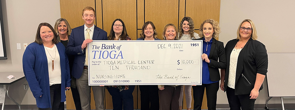 tioga medical center accepting check from the bank of t